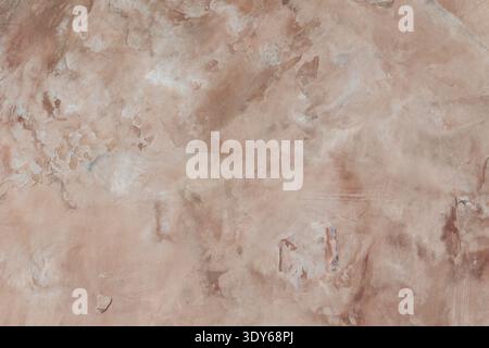 Beige weathered concrete wall texture with aged paint and rustic surface detail Stock Photo