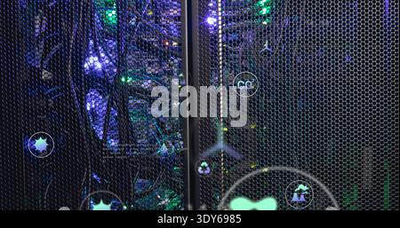 Showing servers and switches glowing through hexagonal mesh door in server room, with status icons Stock Photo