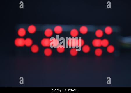 Patterns of light formed on an LED matrix display by defocusing Stock Photo