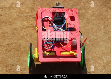 3D printed robotic car that is built as a prototyping project in testing. Do it yourself robotic cars for learning various concepts Stock Photo