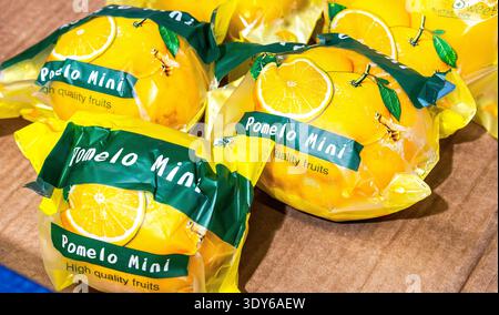 Samara, Russia - April 12, 2025: Pomelo fruits for sale at the grocery store Stock Photo