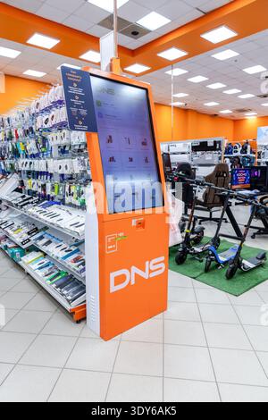 Samara, Russia - April 12, 2025: Self-service terminal at the DNS electronics store Stock Photo