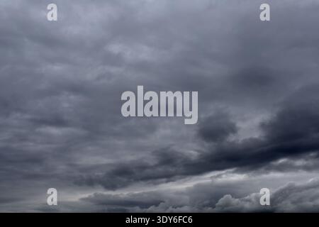 Dark cloudy sky. Storm gloomy heaven cloudscape. Nature dramatic skyscape background Stock Photo