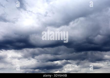 Dark cloudy sky. Gloomy heaven cloudscape. Nature dramatic skyscape background Stock Photo