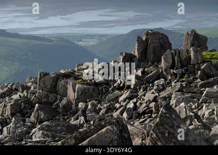 View from Bera Mawr over North Wales coast and Coedydd National Nature Reserve in Snowdonia National Park Stock Photo