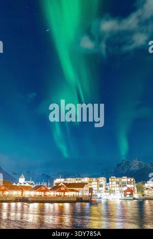 Northern Lights shine over Svolvaer in Vagan, Nordland, Lofoten Islands, Norway at night Stock Photo