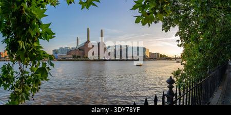 View of Battersea Power Station by the River Thames on a summer evening in Nine Elms, London, England, United Kingdom Stock Photo