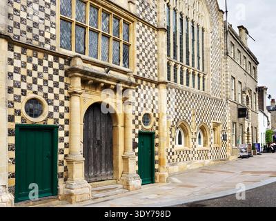 Guildhall stands in Kings Lynn Norfolk showcasing historic architecture on a central street during midday hours Stock Photo