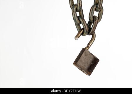 An old metal chain lock security concept, rusty chain broken link, antique padlock damage, isolated white background minimal closeup detail Stock Photo