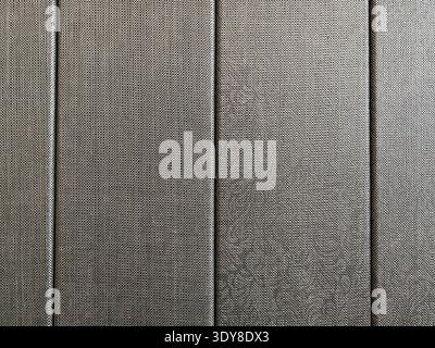 Abstract view of metallic or woven grey textured vertical panels. Stock Photo