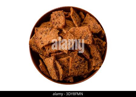 Croutons or crackers made from rye bread with garlic, salt, and spices, a salad ingredient. Croutons with salt and garlic as a food background for you Stock Photo