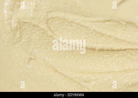 Macro texture of smooth creamy hummus top view. Stock Photo