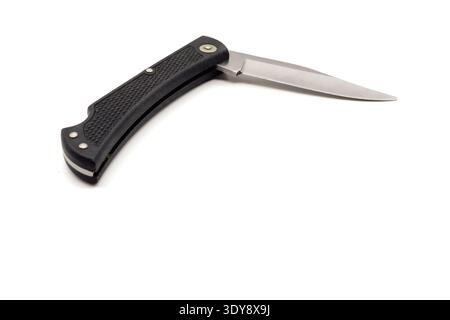 Single folding pocket knife with black textured handle and open stainless blade isolated on white background. Stock Photo