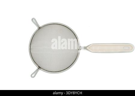Top-down view of a small round stainless steel mesh strainer with plastic handle on white background Stock Photo