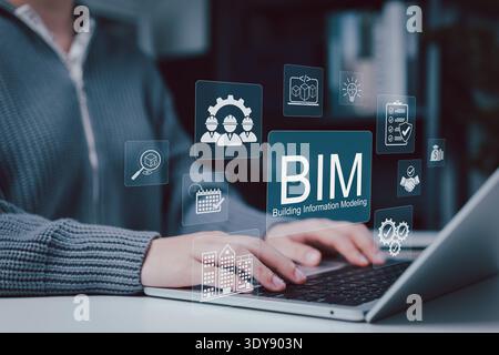Building Information Modeling BIM technology concept. Engineer or architect using laptop with BIM managing construction planning, digital design, Stock Photo