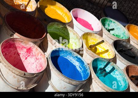 Vibrant Buckets Of Paint In Varied Colors, Showcasing Rich Hues And Textures. Stock Photo