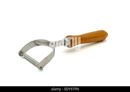 Potato peeler, a kitchen tool used to peel vegetables with tough skins capable of being sliced.Isolated on white background Stock Photo