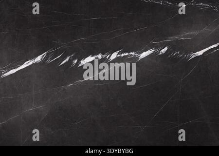 Natural marble background in adorable strict black color. Stock Photo