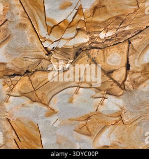 Closeup surface of brown granite pattern. Seamless square background, tile ready. Stock Photo