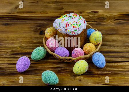 Easter cake and easter eggs on a wooden table Stock Photo