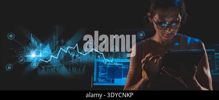 A woman focuses on a tablet, surrounded by glowing blue digital data visualizations, charts, and AI icons, symbolizing advanced technology, data Stock Photo