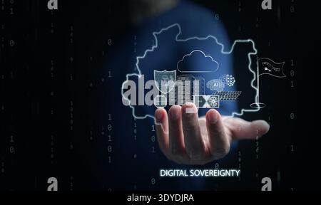 Digital sovereignty concept. Man palm supporting national map outline filled with icons of AI, server, cloud computing, energy infrastructure, chip, s Stock Photo