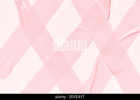 Intersecting pink tape strips on white background showcasing textural and abstract art patterns. Stock Photo