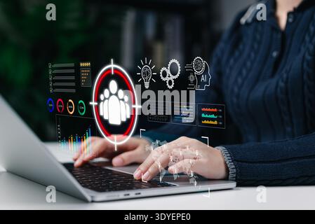 Concept of AI powered customer targeting and data analytics in digital marketing. Person analyzing audience insight, performance metrics, data Stock Photo