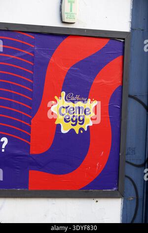General views of a Cadbury Creme Egg poster adverts in Leytonstone, London, UK. Stock Photo