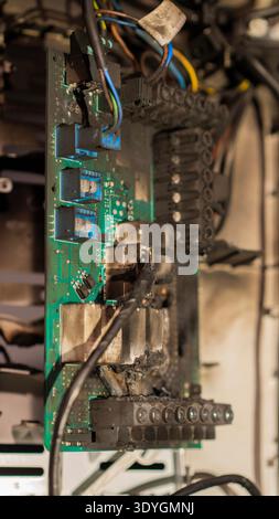 Electrical board with fire damage, fire occurred in an electric boiler of the heating system Stock Photo