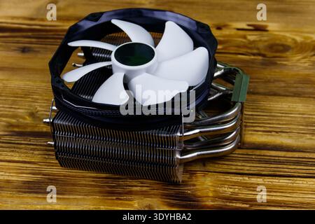 Modern CPU cooler on a wooden desk Stock Photo