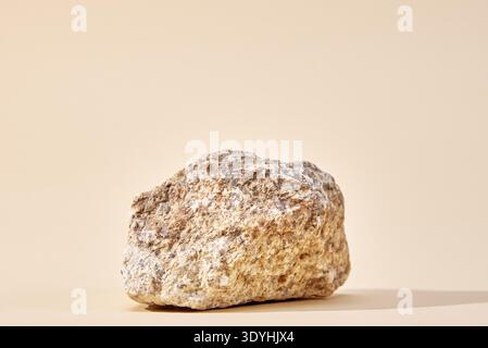 Natural granit stone on beige background, minimal product podium Stock Photo