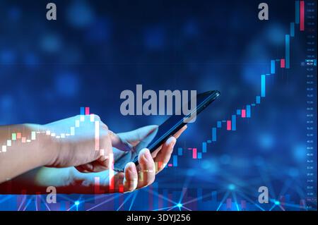 Business man trader investor analyst using mobile phone app analytics for cryptocurrency financial market analysis, trading data index chart graph on Stock Photo