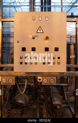 Greenhouse electrical control cabinet with switches, automation systems. hydroponic management. Stock Photo