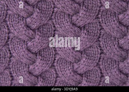 Pink cable Knit Fabric wool sweater background. Knitted texture Stock Photo