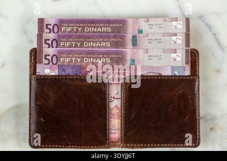 Jordanian currency. 50- dinars bills. Flat lay. Close up. Business and financial concept Stock Photo
