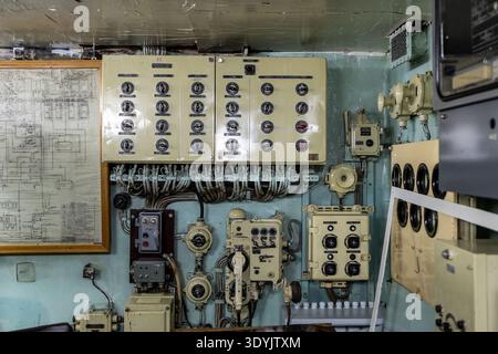 Murmansk, Russia - February 11, 2026: toggle switches on control panel in ship wheelhouse during excursions to museum in nuclear powered Soviet icebre Stock Photo