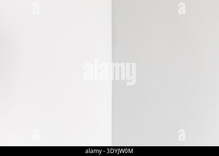 corner of room with gray, freshly plastered walls during apartment renovation Stock Photo