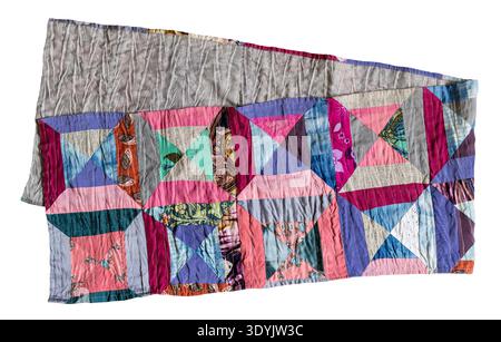 folded handcrafted long patchwork scarf stitched from various silk fabrics isolated on white background Stock Photo