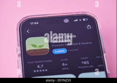 Mainz, Germany - March 04, 2026: Close-up of a smartphone screen showing the Forest productivity and focus timer app listed in the Apple App Store. Stock Photo