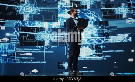Engineer studying AI brain for data structures and predictive analytics, highlighting smart technology and deep learning for innovation and productivity. Algorithmic thinking. Camera B. Stock Photo