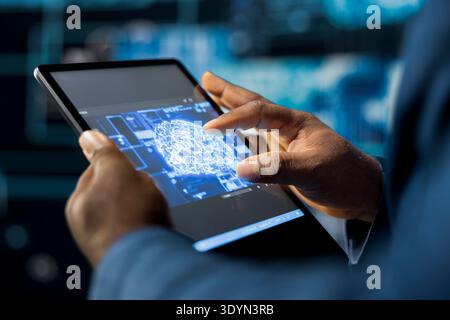 Digital concept of African American professional exploring artificial intelligence, showcasing machine learning algorithms, high tech neural networks and futuristic data structures. Stock Photo