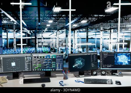 Neural network software running on PCs in data center with multiple rows of fully operational server racks. Computer systems using AI tech in server room built for digital storage systems Stock Photo