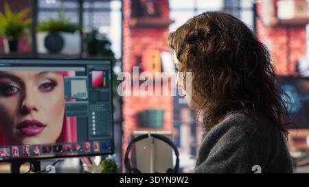 Photographer using modern editing program to create high quality photos, retouching technique with professional tools. Graphic designer transforming pictures on an interface. Camera B. Stock Photo