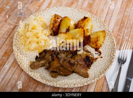 Appetizing fried rabbit liver with vegetables Stock Photo