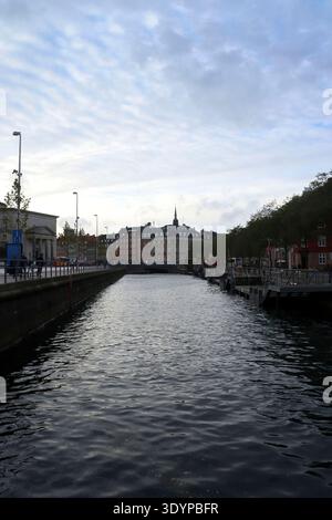 Copenhagen, Denmark - October 12, 2019: Slotsholmskanalen canal in Copenhagen, Denmark, looking towards the Gammel Strand area on a cloudy autumn day. Stock Photo