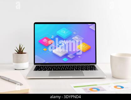 Laptop displaying a colorful user experience - UX - design interface on a modern white desk. Workflow and new ideas Stock Photo