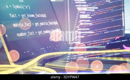 Futuristic Coding Workspace with Source Code Screens, Stylus Pen and Warm Bokeh Light Stock Photo