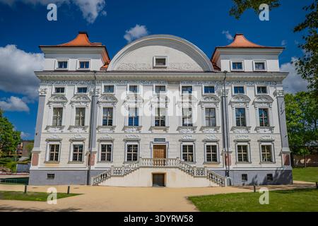Close-up of the ornate Baroque window decorations and stucco moldings on the recently restored facade of the Sapieha Palace in Vilnius, Lithuania. Stock Photo