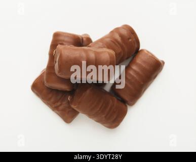 Small chocolate candies isolated on white Stock Photo